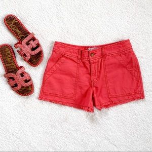 Free People Coral Slub Sateen Utility Cargo Cutoff Frayed Shorts in Sunrise